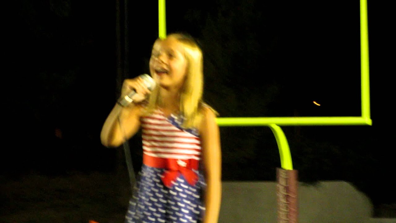 9 year old Madelyn Joy singing the National Anthem at U of Redlands vs Occidental football game