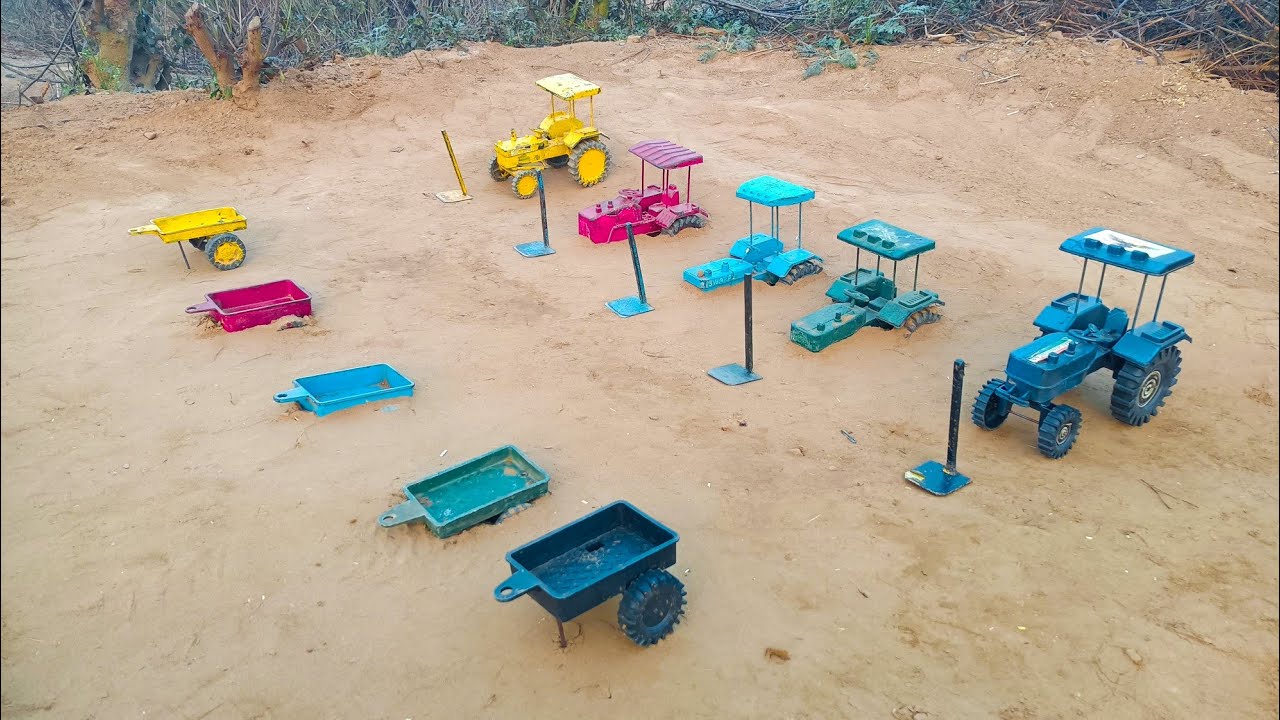 Three tractor trolleys in the middle got buried in the mud and were taken out