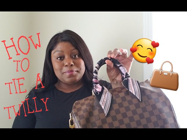 How to tie a beautiful bow on a bag with twilly .Accessorizing handbag  handles with twilly. 