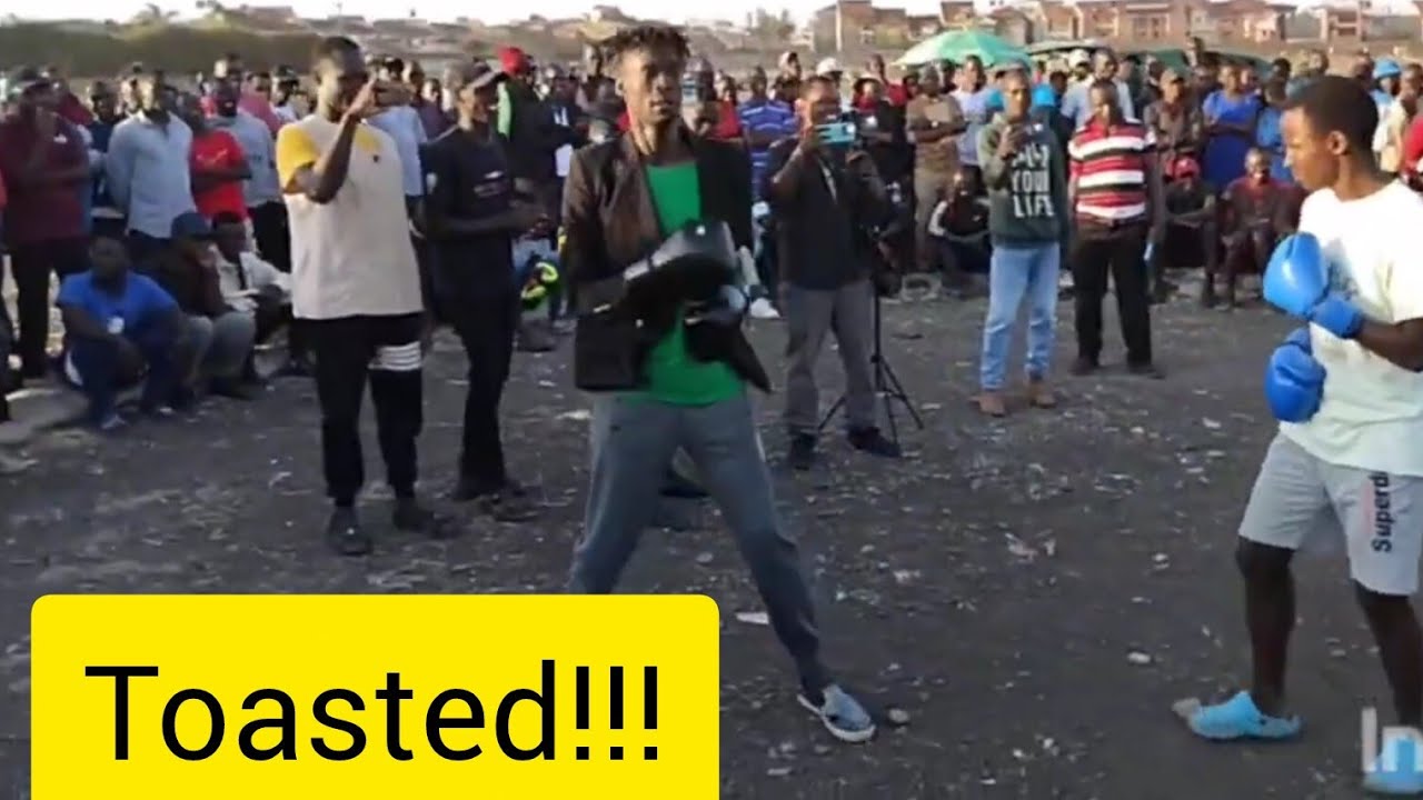 A  small trained fighter Vs a huge untrained man in a street fight.