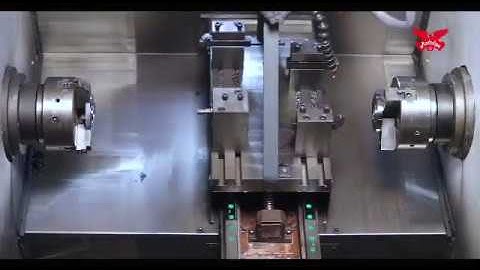 CNC TWIN SPINDLE TURNING MACHINE