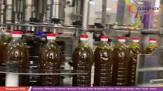 Integrated Net Weight Filling and Capping Solution for 1L Mustard Oil Bottles- Speed 230 BPM