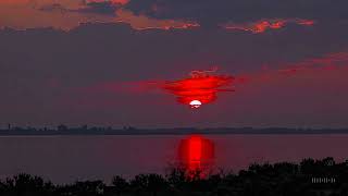 OpenAI Sora - Fiery Sunset Reflection