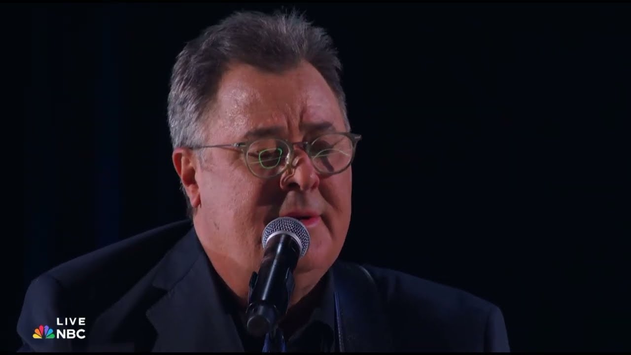 Vince Gill Dedicates "Go Rest High On That Mountain" To Mom And Late Brother  During Opry 100