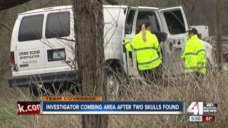 Investigators combing area after two skulls found