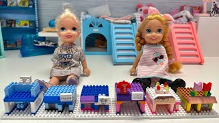 Building with blocks with Elsa and Anna toddlers and their friends part 2