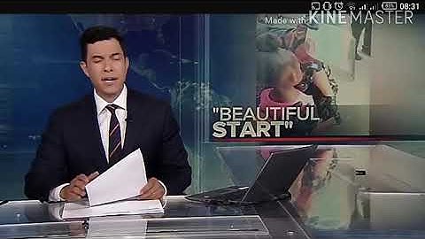 A police officer comforts a 5year old girl after she asks r u going to shoot us.