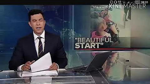 A police officer comforts a 5year old girl after she asks r u going to shoot us.