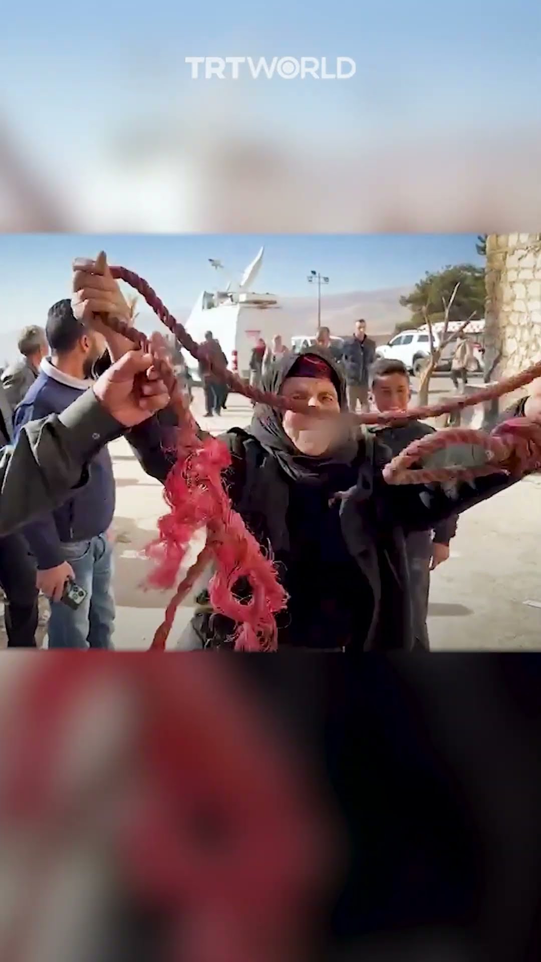 Syrian woman laments after finding noose in Sednaya prison