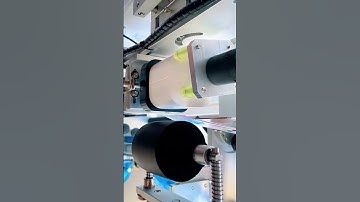 Automatic labeling machine labels square bottles of detergent