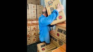 Busy loading containers at our warehouse under strict supervision, preparing shipment