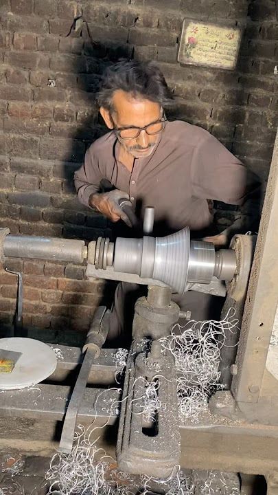 A worker at a local factory is making aluminum silverware daily #silver #aluminum #shorts