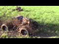 Traxxas summit in slow motion in the mud