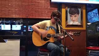 Kevin Swenson at Straw Hat Pizza open mic performing "Gotta Serve somebody". screenshot 2