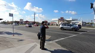 Long boarding  cruise around the city side walk