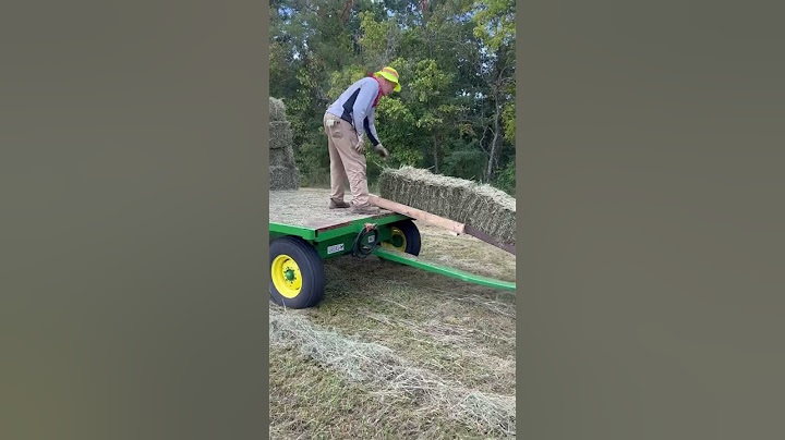 The PERFECT setup for baling hay!!!        #country #farmlife #homestead #worksmart #hay #tractor