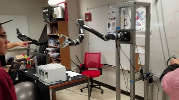 Unity-based Jaco2 VR simulation with real-time motion tracking and robotic control
