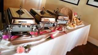 Buffet table set up at Hannah Nicole Vineyard with floral accents. The bread baskets at the end are not to be missed! Credit goes ...