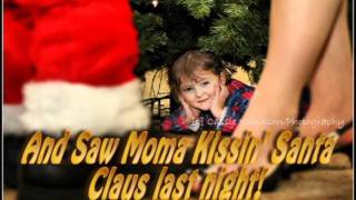 Video thumbnail of "John Mellencamp - I saw Mommy kissing Santa Lyrics"