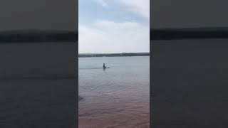 Guy Rides Bike Out Of Lake Superior In Marquette Michigan