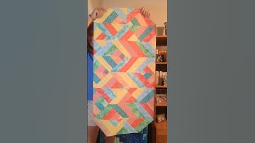 Create an Eye-Catching Geometrical Table Runner with Jelly Roll Strips