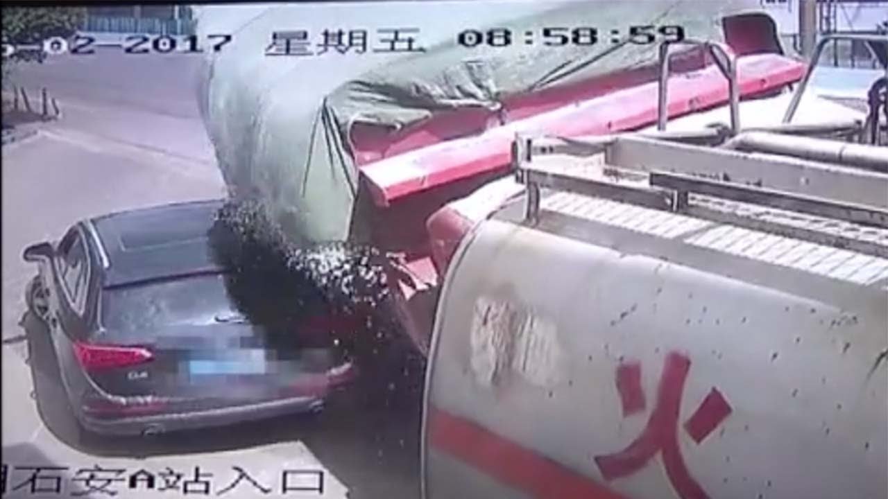Lucky escape for SUV driver after being crushed by gravel and lorry in ...