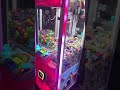 Claw Machine Mini Squishy Green Alien Win at the Watersound Arcade in Inlet Beach FL