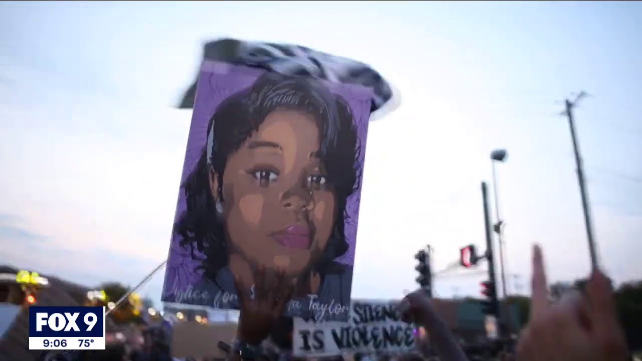 Protesters march on I-94 in St. Paul, Minnesota following charging decision in Breonna Taylor case