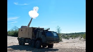 SISU 8x8 hook-lift truck serving as a platform for a 120 mm mortar turret container.