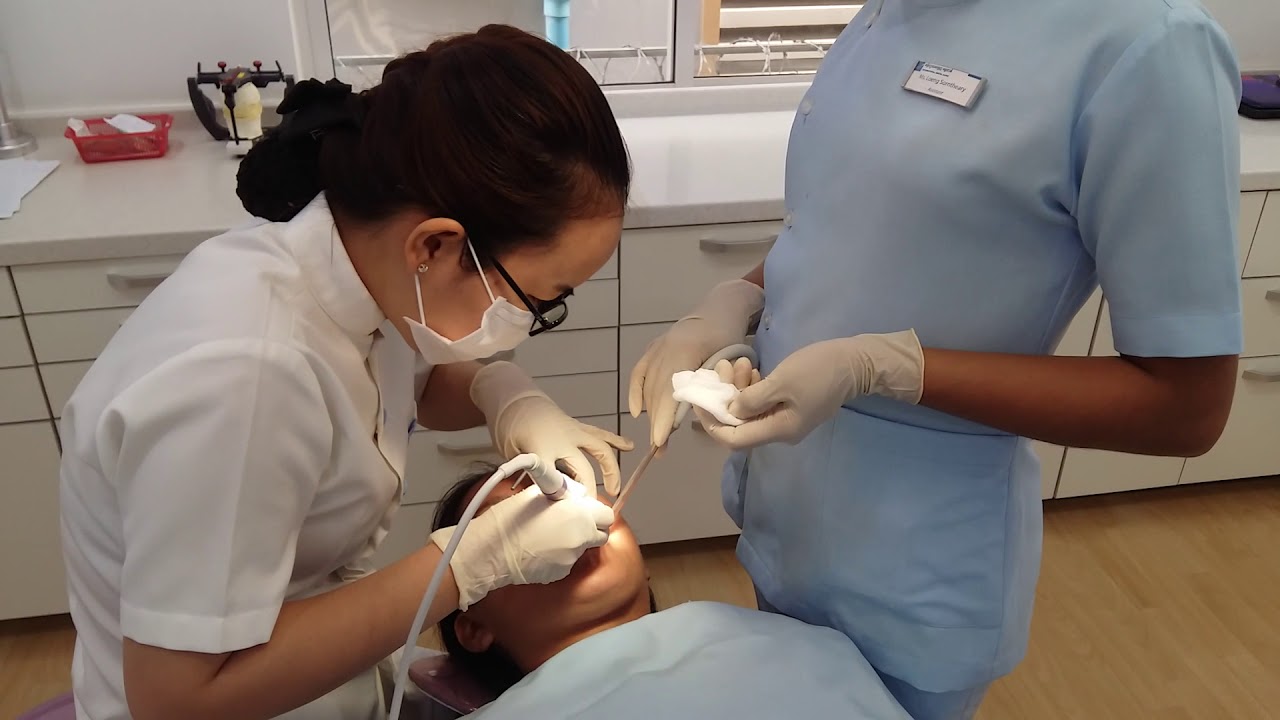 Dr Ratha Clean Teeth with Dr Ratha At International Dental Clinic - YouTube