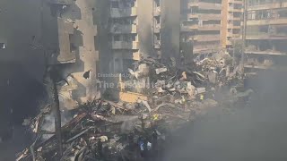 Buildings in central Beirut reduced to smoldering rubble by deadly barrage of Israeli airstrikes