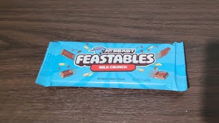 eating milk crunch feastables chocolate