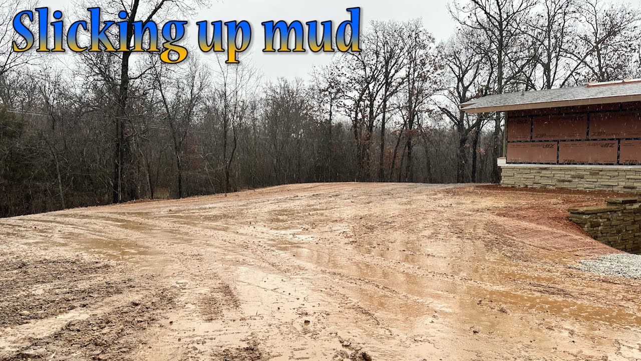 Finishing The Rough Grade On The Stone House In The Rain - YouTube