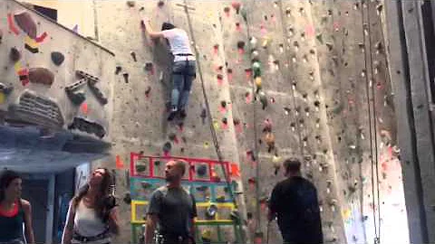 Deborah doing the rock climb downtown Flagstaff.