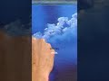 Bob Ross shows you how to add some happy little clouds to your painting
