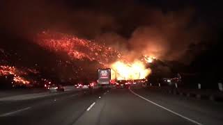 The sign on right reads, "getty center next exit." driving 405 freeway
in la looked like hell before dawn wednesday. (video courtesy
@joebrennan87 / ...