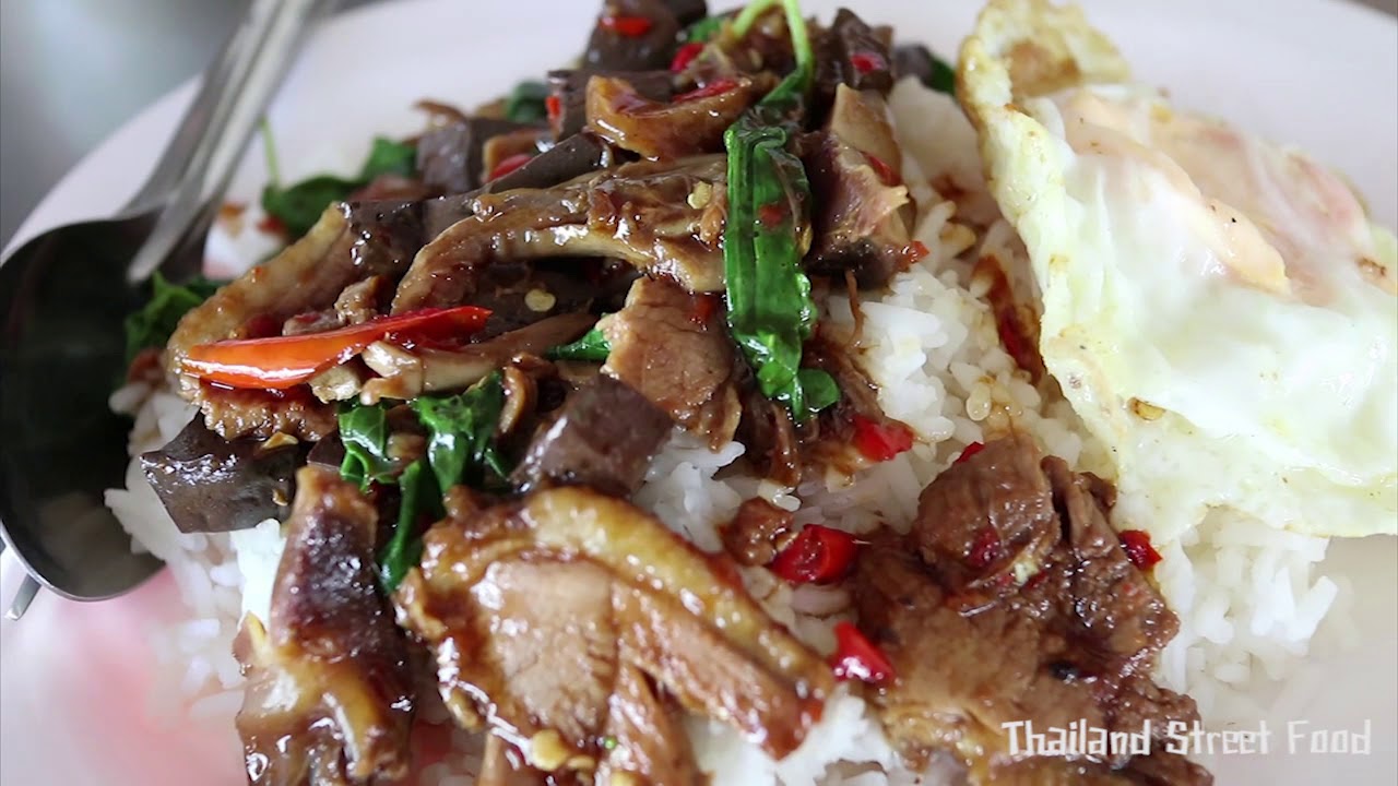 ข้าวกะเพราเป็ด Rice topped with stir- fried duck and basil