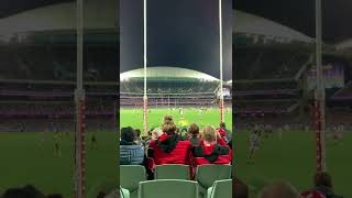 Boy gets hit by ball while seated in the audience stand at the game (Rugby)f