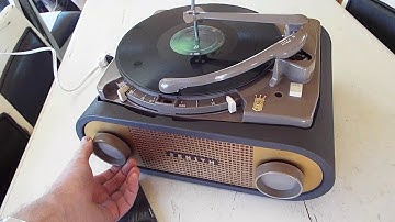 Zenith Stroboscope Cobramatic 1958 record player playing an LP 33.3rd RPM record.