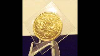 1986 Japan 100,000 yen GOLD coin