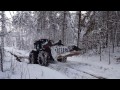 Valtra a93 almost stuck in snow and mud with heavy timber load