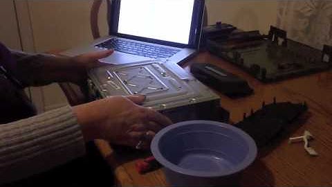 Instructions on replacing an Xbox 360 shell. My mother part 2