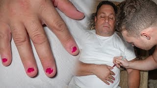 Painting my dads nails while he sleeps.. (PERMANENT MARKER)