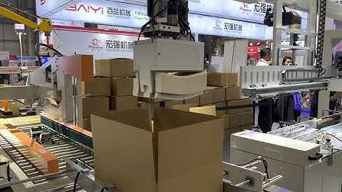 DGM folder gluer with automatic baler.