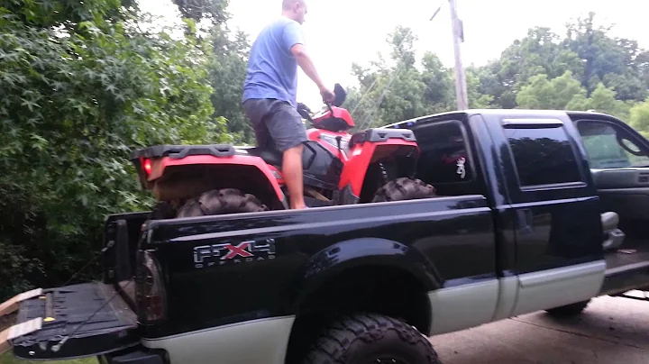 Loading 4 wheeler into lifted truck