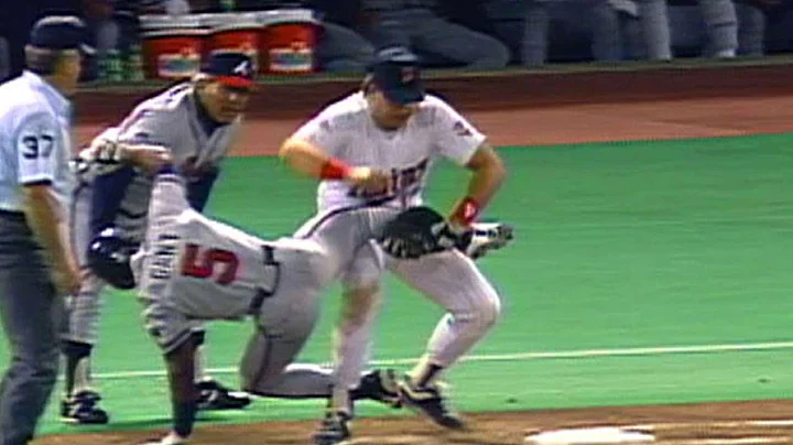 1991 WS Gm2: Hrbek lifts Gant off the bag for the ...