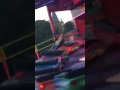 Guy Standing on Carnival Ride