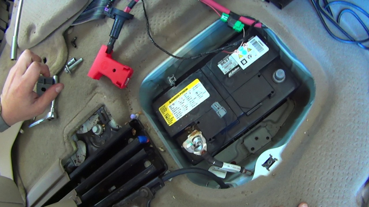 How To Replace Battery in GMC Acadia, Chevy Traverse, and ... 2011 buick enclave fuse box location 