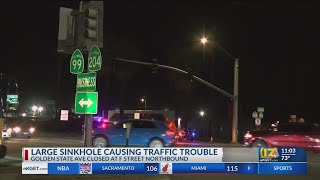 Large sinkhole causing traffic issues on Golden State Avenue