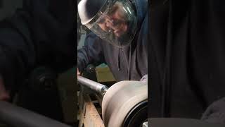 Turning the inside of a vase.